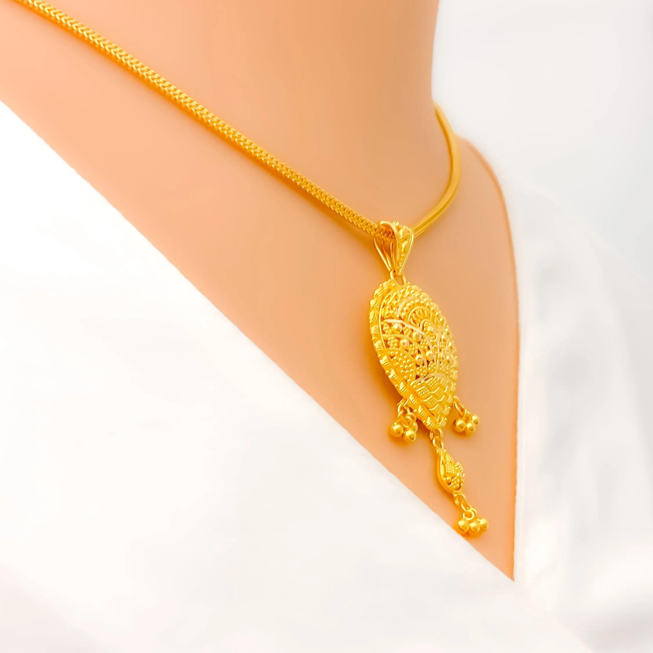 Refined Regal 22k Gold Pendant