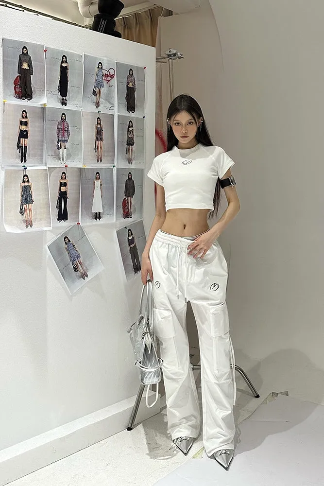 Sia Solid Color White Slim Short Sleeve Cropped Top   High Waist Baggy Multi-Pocket Cargo Pants Matching Set